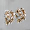 Un Par de Aretes Redondos de Perlas Aretes Retro Franceses Hepburn de Lujo Ligero 2024 Nueva Moda Aretes de Primavera