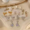Pendientes Minimalistas Estilo Ins 2026, Pendientes de Temperamento Nicho de Lujo Ligero para Mujer, Tachuelas Mariposa de Diseño de Alta Gama