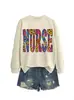 Amazon eBay sitio independiente casual de moda personalizado para mujer enfermera colorido estampado de leopardo otoño e invierno sudadera de cuello redondo