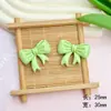 Dibujos animados lazo brillante accesorios de resina diy funda de teléfono móvil refrigerador soporte para teléfono móvil parche material para accesorios de cabello venta al por mayor