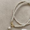 Collar de Perla de Vidrio Cobre Micro-incrustado Zircón Hebilla Ot Diseño Nicho Lujo Ligero Resaltar Perla Estilo Frío Cadena Clavícula para Mujeres