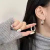 Aretes de aro de pigmento dorado plateado de alta calidad para mujer, aretes de diseño nicho de lujo ligero, aretes nuevos de moda