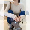 Camiseta básica de punto de color liso para mujer, corte ajustado, nuevo estilo primavera y otoño 2025, suéter elegante de cuello redondo, top de manga larga para usar en capas o como prenda exterior