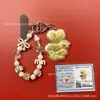 Llavero de tela con logo de empresa personalizado Cadena para teléfono móvil Angela Lámina de oro puro Oro 999 Regalo de aniversario