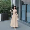 Vestido Largo de Moda Francesa de Manga Larga con Escote en V Cruzado y Pliegues para Mujer Primavera y Otoño Temperamento Delgado Ajustado en la Cintura Fruncido Dobladillo Ancho Forma de Paraguas Vestido Largo