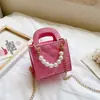 Bolso para niños estilo coreano 2021 nuevo bolso pequeño de charol con perlas bolso bandolera para bebé bolso de hombro para niños