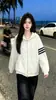 Nueva chaqueta casual versátil de moda de nicho para otoño, sudadera con capucha versátil de moda única y simple para mujer