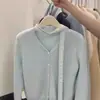 Top de Punto para Mujer Coreano de Manga Larga Azul con Cuello en V, Sentido del Diseño, Encaje Fluyente, Estilo Occidental para Mujeres Pequeñas, Otoño e Invierno 2024