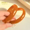 Venta al por mayor del fabricante Pulsera de Jade de Semilla Huangqin Imitación de Jade Hetian Material de Mongolia Exterior Sala de Transmisión en Vivo Huangkou Huangqin Producto Nuevo Caliente