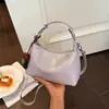 Bolsa Tote Retro de Grande Capacidade Feminina 2026 Nova Pequena Marca para o Trabalho Transversal Simples Tendência Versátil Bolsa de Ombro