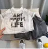 Ropa Infantil Estilo Coreano Conjunto de Verano para Niños 2026 Nuevo de Moda Fresco Camiseta de Manga Corta para Niños Ropa de Verano Elegante para Niños