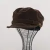 Moda coreana otoño e invierno gorra plana de ala ancha para mujer, gorra de artista versátil, gorra de vendedor de periódicos de gamuza de alta gama