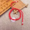 Cuerda roja tejida a mano para el año de vida para mantener la paz hebilla de paz de jade sintético cuerda de mano ajustable roja pulsera de la suerte