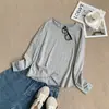 Camiseta Manga Longa Gola Redonda 100% Algodão de Bambu Confortável Macia Estilo Coreano Primavera Verão Nova Chegada Cor Sólida Casual Versátil Top Feminino