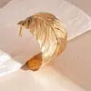 Anillo Abierto de Metal con Hojas Cruzadas Europeo y Americano Anillo de Brazo Luz Lujo Alto Grado Temperamento Pulsera Nicho Personalidad Estilo Minimalista Accesorio de Mano