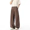Calça casual masculina nova de alta qualidade em cor sólida da moda, calça drapeada de perna larga solta estilo Hong Kong para homens e mulheres
