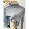 Suéter de punto con cuello semi-alto OEM para mujer, modelo otoño e invierno 2026, color albaricoque, top de manga larga, camiseta básica ajustada