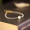 Pulsera de gato de concha de cristal blanco diseño de nicho femenino pulsera de amigas pulsera de belleza dulce de fritilaria