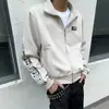 2026 Nueva Chaqueta Corta de Otoño de Nicho con Notas Flotantes y Cuello Alto Blanco Abrigo Casual Unisex