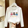 Camiseta de manga comprida para meninas, algodão puro, estilo primavera e outono, versão coreana, solta, simples, casual, gola redonda, camiseta básica fofa para crianças mais velhas