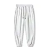 Nuevos pantalones joggers transfronterizos para hombre de primavera y otoño, pantalones deportivos de moda de corte holgado para otoño e invierno, pantalones de chándal versátiles de gofre, pantalones casuales