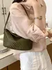 Bolso de mano liso súper popular transfronterizo para mujer, nuevo modelo 2026, diseño de nicho, bolso cruzado versátil de alta gama para el día a día