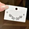Pendientes Combinados de Mariposa y Flor con Aguja de Plata S925 Dulces Pequeños Exquisitos de Moda Circonita Pendientes para Mujer Versátiles de Lujo Ligero