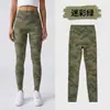 Pantalones de yoga camuflaje transfronterizos para mujer, pantalones de tiburón de primavera para exteriores, leggings ajustados de nueve puntos con control de abdomen, pantalones Barbie sin costuras