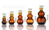 Té color calabaza doble vidrio aceite esencial botella vacía esencia cosmética gotero botella bomba de spray aceite esencial botella con rodillo