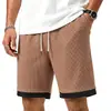 Pantalones cortos casuales de gofre para hombre transfronterizos con dobladillo de color contrastante, cintura elástica, corte recto, longitud media, pantalones de moda de verano