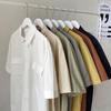 Camisa de manga corta de color liso de verano para hombre, estilo japonés, holgada, de media manga, estilo Hong Kong, blanca, moderna.