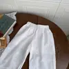 Ropa Cutemily para niñas bebés, pantalones de algodón de color liso de pierna ancha, pantalones largos casuales de verano bordados con lazo para niñas