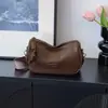 Bolso de almohada de color liso retro muy elegante, nuevo de principios de otoño de 2026 versión coreana, bolso de hombro para mujer para el trabajo y los desplazamientos, bolso cruzado