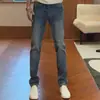 Jeans para Hombre Otoño Nuevo Producto Lavado Azul Retro Estilo Hong Kong Versión Coreana Moda Lujo Ligero Versátil Ajustados