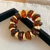 Pulsera elástica de cuentas redondas geométricas de resina Brazalete exagerado retro Pulsera de mano versátil de cara ancha transfronteriza europea y americana