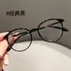 Armazón de anteojos versión coreana TR90 ultraligero 7g 9565 para mujer, armazón redondo pequeño retro color té, anteojos sin graduación de comercio electrónico en línea al por mayor