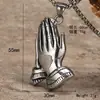 Fábrica de origen venta directa por lotes acero inoxidable manos de oración punk colgante de personalidad ins hipster hip hop collar para hombres y mujeres