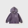 Otoño 2026 Nuevo Color Sólido Moda Brillante Principios de Otoño Sudadera Cómoda para Niños Holgada Moderna con Capucha Top para Niños