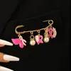 Broche de cadena nuevo transfronterizo para hombres y mujeres estilo frío mariposa amor cruz pin punk hip hop pin de hebilla para traje