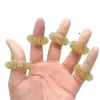 Suministro Transfronterizo Anillo Masajeador Masajeador de Dedos. Los Anillos de Masaje para Dedos Están Disponibles en Dorado y Plateado