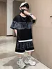 Conjunto Esportivo Infantil 2025 Verão Novo Estilo Crianças Estilo Coreano Manga Curta Tamanhos Médio e Grande Crianças Tendência Shorts Conjunto de Duas Peças