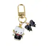 Llavero de gatito lindo Colgante creativo Regalo Nuevo Transfronterizo Colgante de mochila de metal Colgante de auriculares