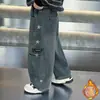 Pantalones para Niños Otoño/Invierno 2026 Nuevo Estilo Jeans con Forro Polar para Niños Pantalones Curvos Atractivos para Niño Ropa de Invierno Pequeño Maestro