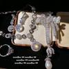 Collar de Cadena Comet Wangyang con Gema Chapado en Oro de 18 Quilates Broche de Lazo con Perla Colgante