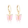 Pendientes pequeños con forma de mariposa y diseño de explosión de Amazon, con clip para las orejas, estrella y luna, a la moda, sencillos, con forma de cono cruzado.