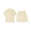 Ropa de estar por casa con solapa de seda adecuada para usar en exteriores, nuevo conjunto de shorts de manga corta para mujer primavera-verano, color liso, amigable con la piel y cómodo