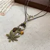 Collar con colgante de símbolo musical de doble capa bohemio, cadena para la clavícula de estilo étnico vintage, cadena para suéter de diseño de nicho