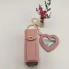 Bolsa Portátil para Labiales Llavero Colgante de Cuero Bolsa de Almacenamiento para Labiales Mini Bolsa con Colgante de Espejo de Maquillaje Venta al por Mayor