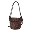 Moda transfronteiriça 2026 design de nicho nova bolsa de balde feminina retrô simples de alta qualidade versátil bolsa de ombro feminina