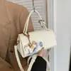 Bolso de mano elegante de alta costura para mujer, nuevo bolso cruzado de nicho para el verano 2026, bolso de hombro vintage con personalidad para Instagram